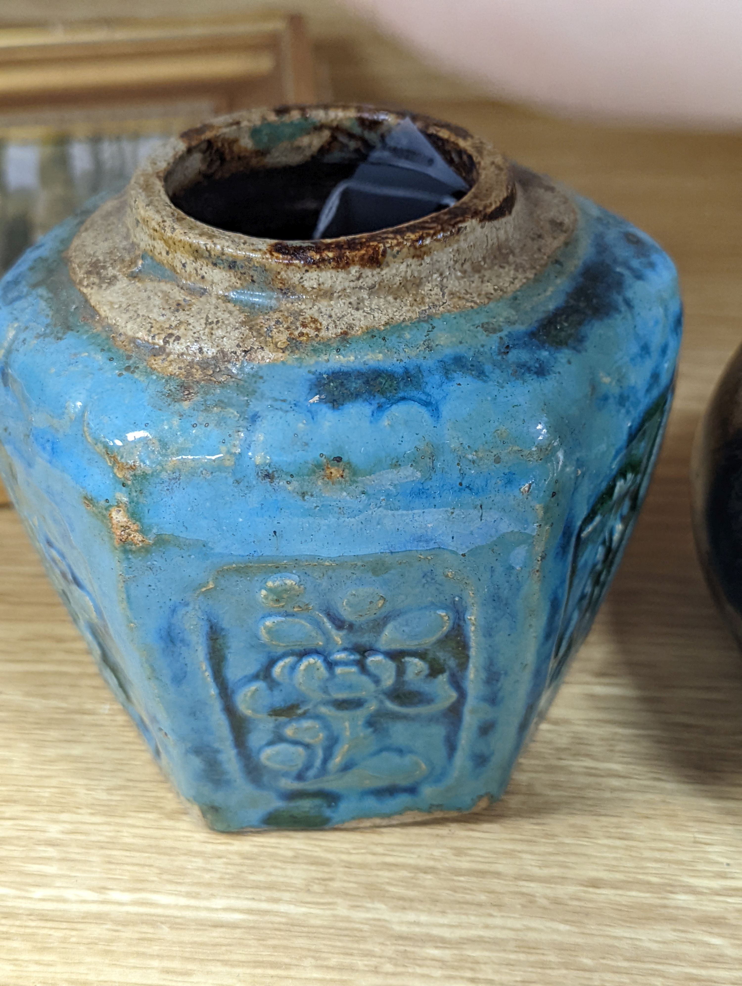 Two Chinese bronze handwarmers and a turquoise glazed jar